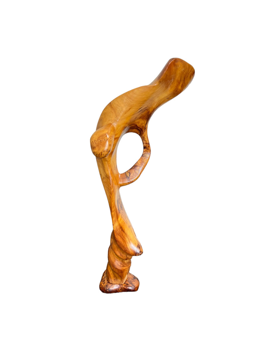 A wooden sculpture of a cobra with an intricate design, part of the 3ar3ar Collection.