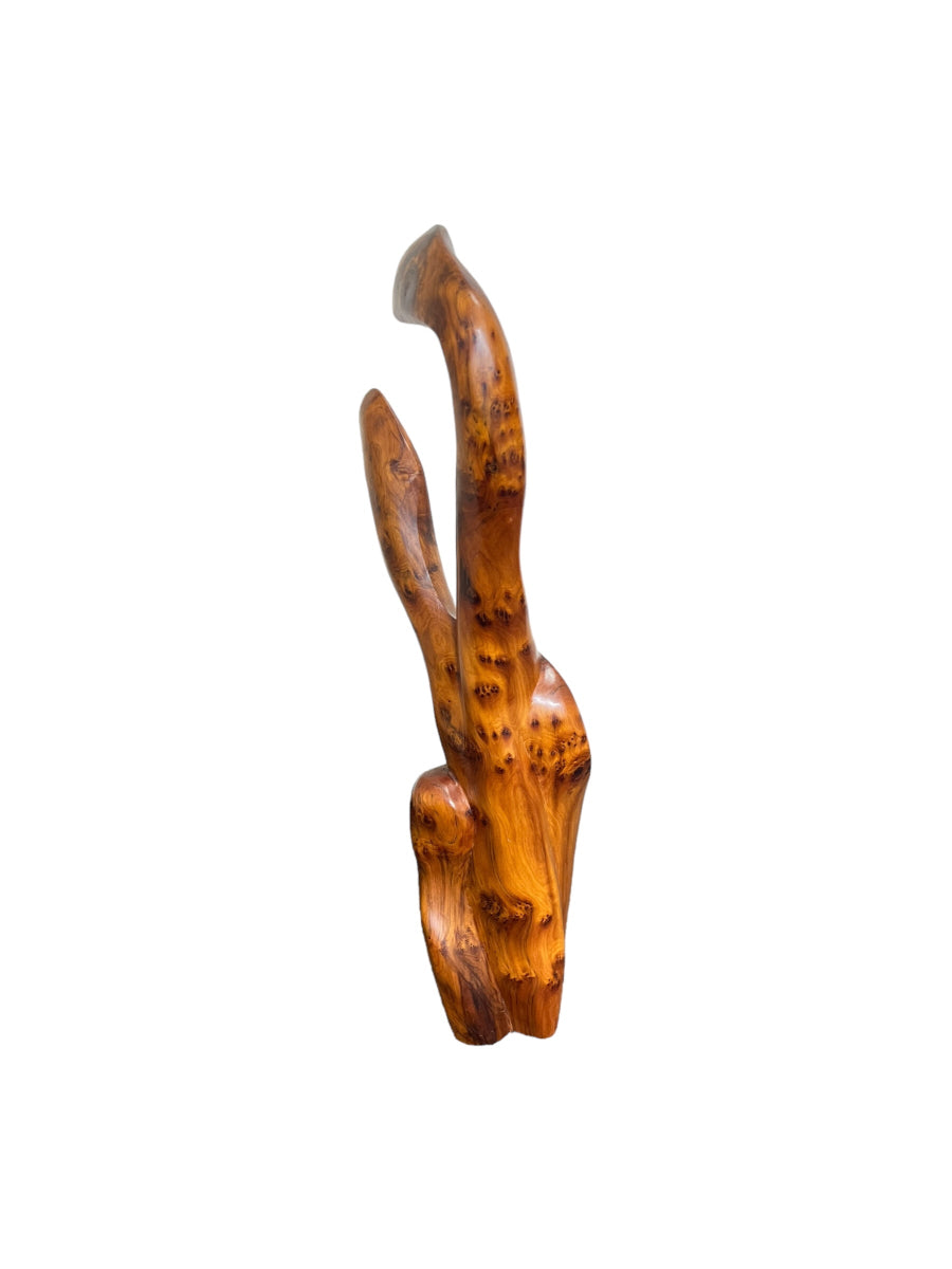 A wooden sculpture with a natural grain finish, part of the 3ar3ar Collection.