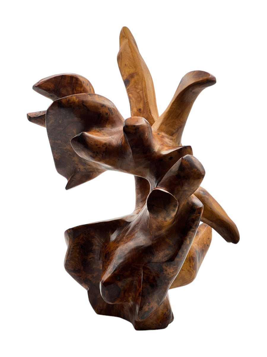 Wooden sculpture with扭曲的形状 on a white background