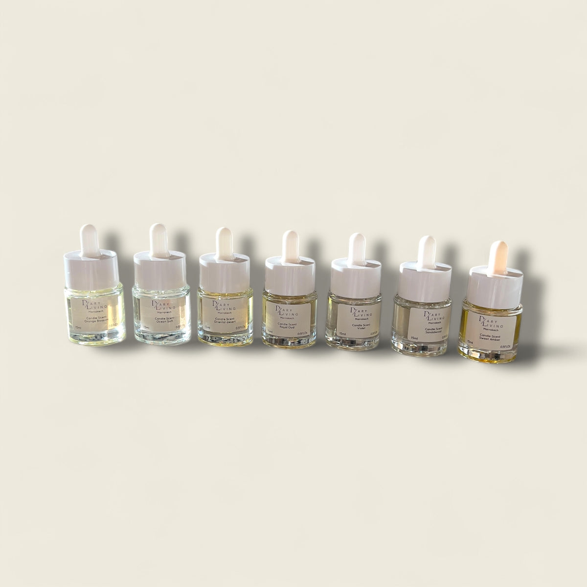 A curated collection of seven Dary Living candle scent dropper bottles from Farm of Marrakesh, Morocco — each handcrafted with 100% organic essential oils sourced from the lush botanical gardens of the Ourika Valley. Ideal for serene interiors, meditation spaces, and restorative spa environments.