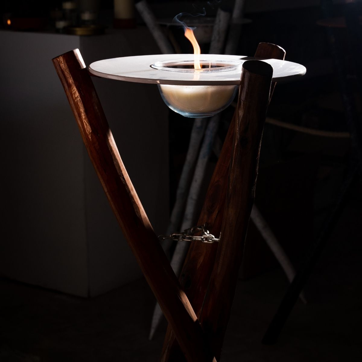Candle in a wooden holder 