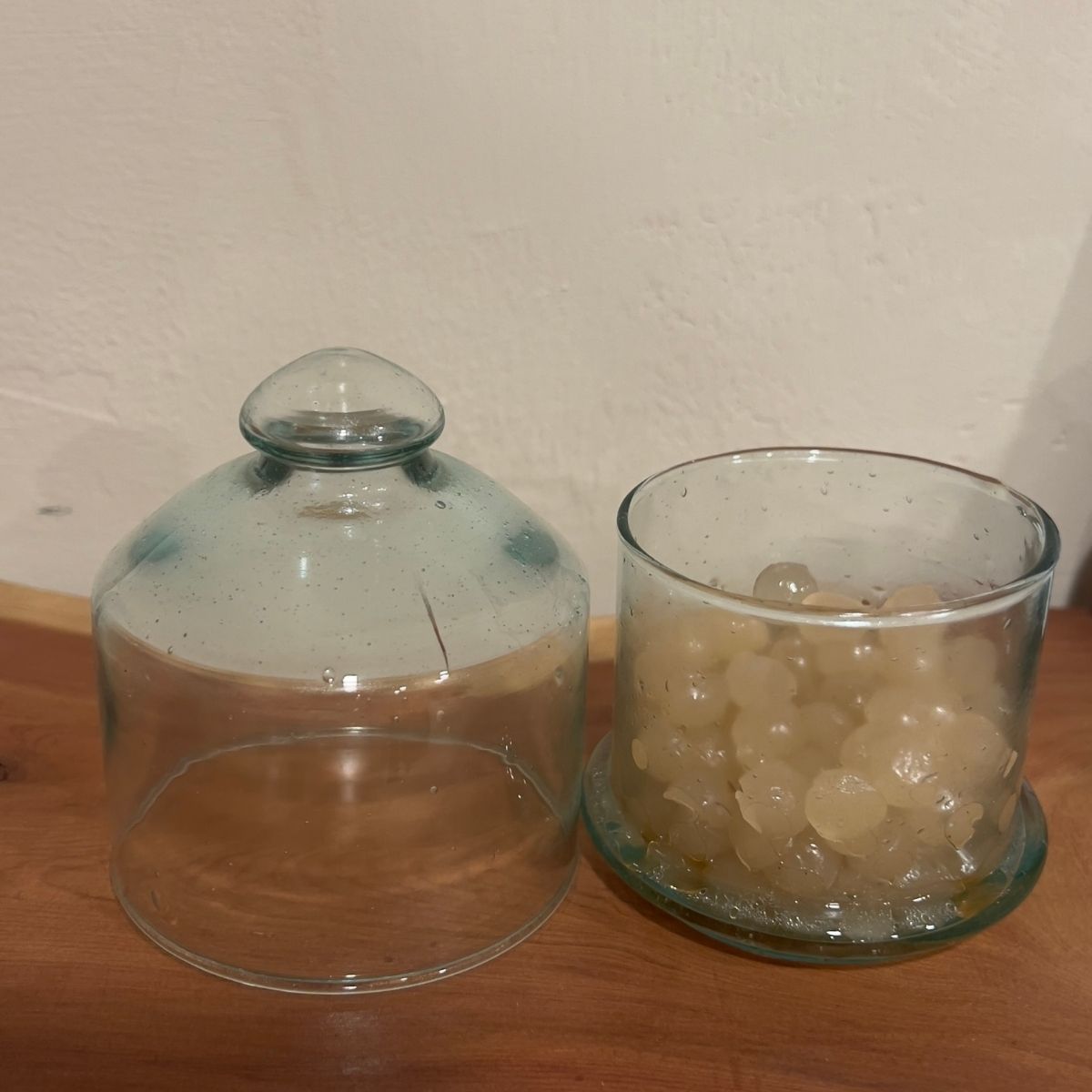 Dary Living’s biodegradable gel wax, elegantly housed within a sleek candle cloche, offers a pristine burn with radiant clarity. Crafted from sustainable, plant-based ingredients, this eco-conscious candle elevates any space with refined sophistication and timeless beauty.