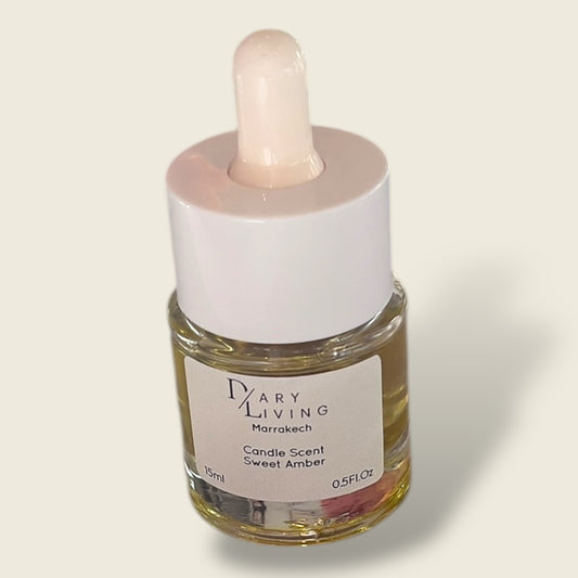 Sweet Amber is a premium pure candle essential oil expertly distilled from organically grown botanicals in the lush Ourika Valley, Marrakesh, Morocco. This natural candle oil captures the rich, warm, and soothing aroma of amber, making it perfect for aromatherapy, natural skincare, and creating calming home environments. Experience authentic Moroccan botanical essence with Sweet Amber, sustainably crafted for wellness and luxury